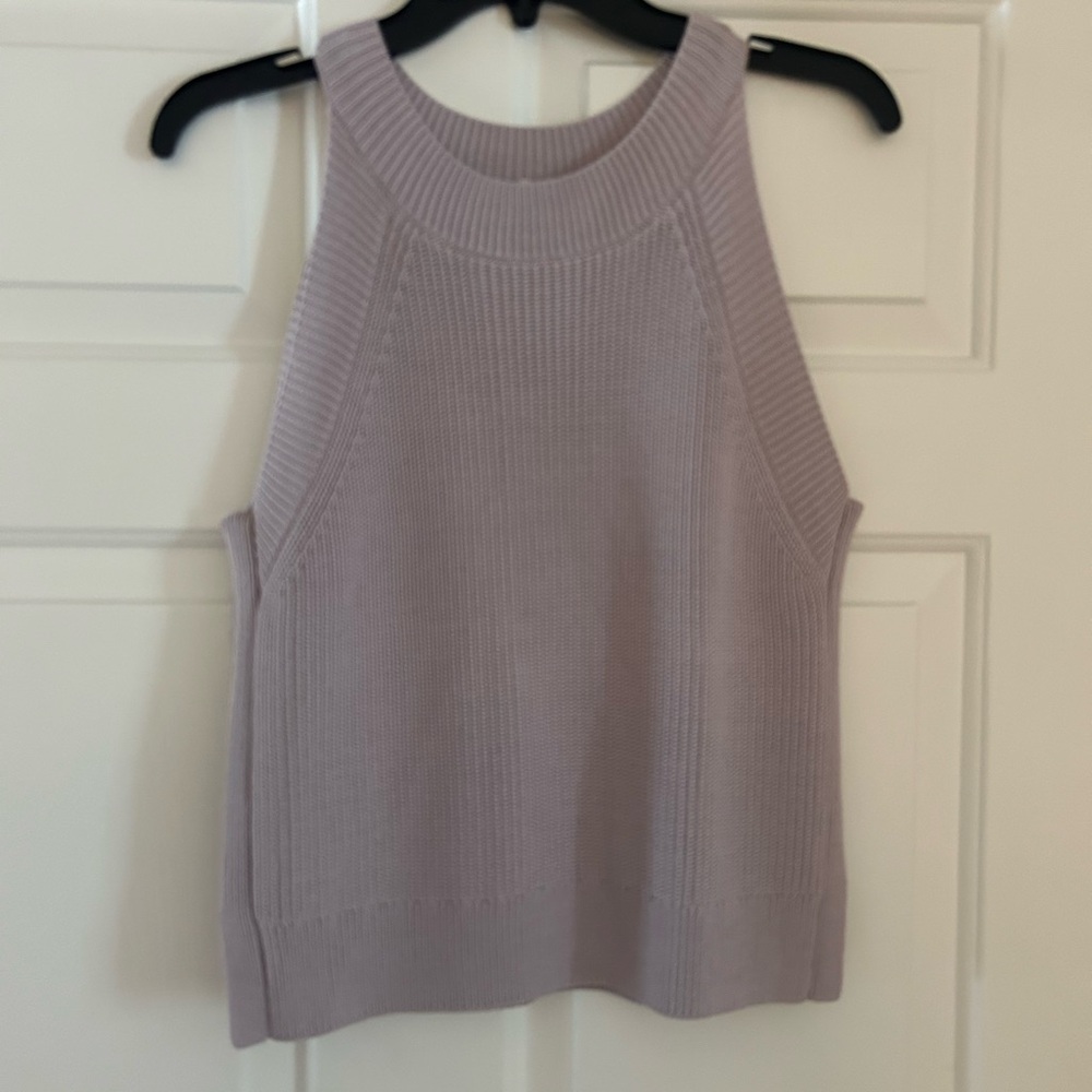 Gianni Bini sweater in a soft lavender shade.